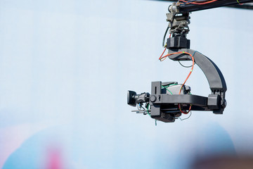 Camera live stream on crane, outside, summer.