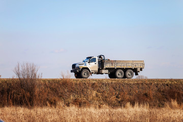 Fototapeta premium URAL NEXT - new russian off road 6x6 truck on a road