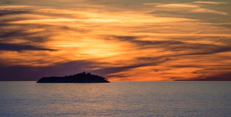Naklejka na ściany i meble Sunset over Sveti Andrija island near Dubrovnik, Croatia