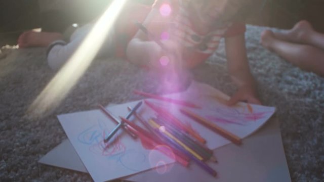 kids playing on floor of modern apartment