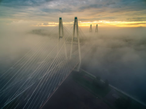 Fototapeta Morning fog. Bridge in a dense fog. St. Petersburg. The bridge in the fog.