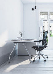 Office chair in front of flat modern desk