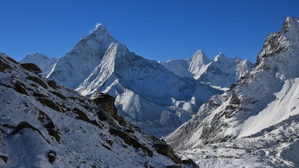 Morning in the Mount  Everest National Park. Mount Ama Dablam after new snowfall.