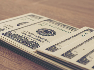 Money on wooden table concept.