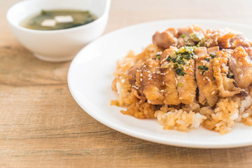 teriyaki chicken on topped rice with miso soup