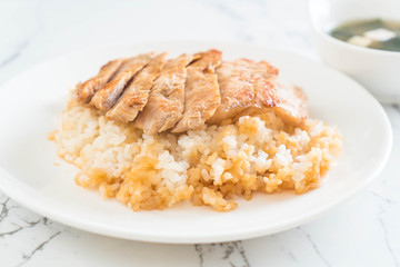 teriyaki pork on topped rice with miso soup