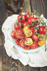 Cherry Tomatoes over wooden desk