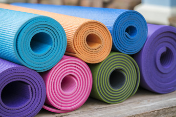 colorful yoga mats on the table