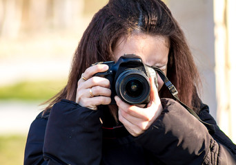 Girl in park with camera