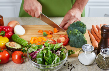 Chef man cooking in the kitchen.