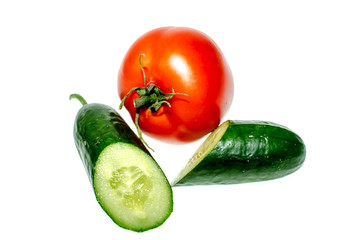 Cucumber and tomato on a white background