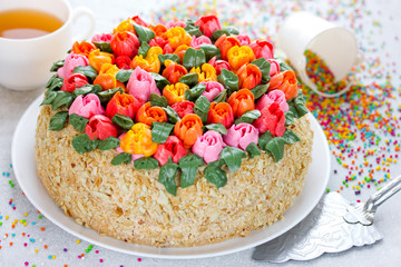 Buttercream flower tulip cake , beautiful festive cake decorated with colorful cream flowers