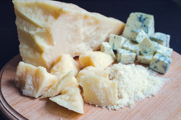 Grated Parmesan and sliced Blue cheese