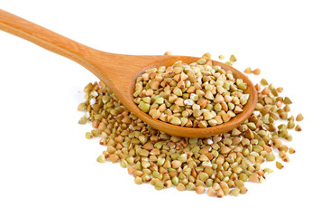 Buckwheat in spoon  isolated on white background