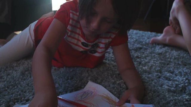 kids playing on floor of modern apartment