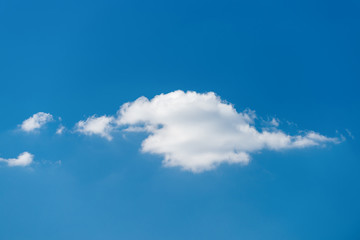 Fototapeta premium Single white cloud on blue sky