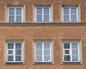 Fototapeta na wymiar Eight modern windows on the facade of the house