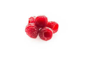 raspberries on the white background.
