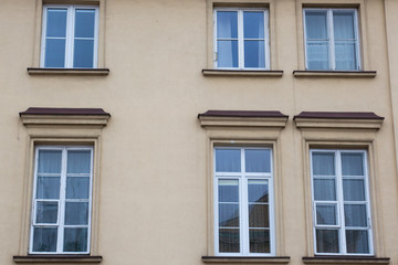 vintage design windows on the facade of the old house