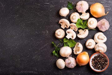 Fototapeta na wymiar fresh champignon mushrooms with vegetables