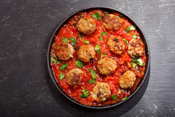 pan of meatballs with tomato sauce