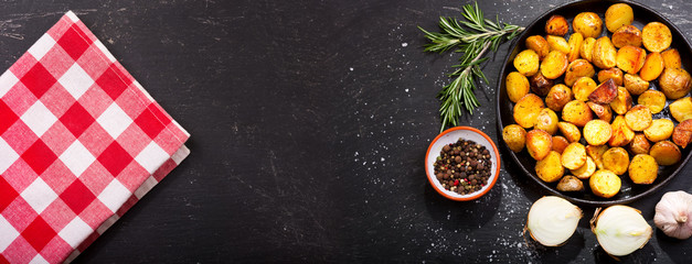 pan of roasted potatoes with rosemary