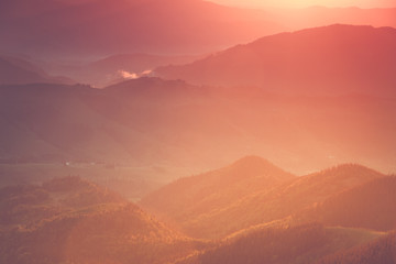 View of the top on fantastic sunlight of beautiful scenery mountain range at sunrise. Abstract nature concept.