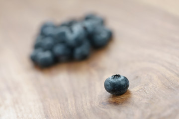 fresh garden blueberries on wood table