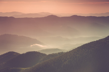 View of the top on fantastic sunlight of beautiful scenery mountain range at sunrise. Abstract nature concept.