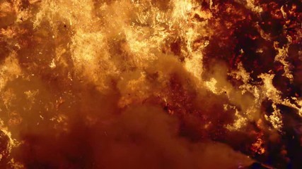 Fire storm, horrific fire destroys gigantic hay bales construction, Red Epic slow motion clip