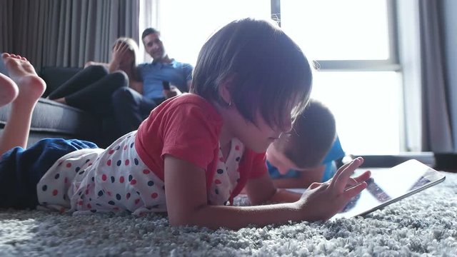 kids playing on floor of modern apartment