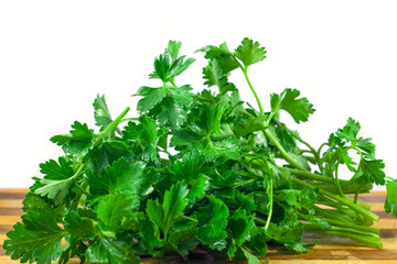 Fresh green parsley isolated on white background, food ingredient