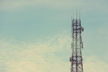 Communication tower over a blue sky