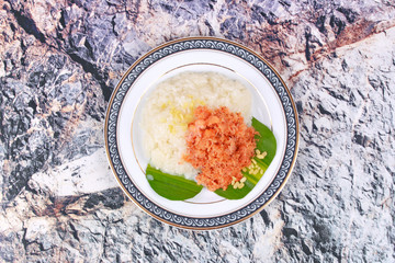 Sticky rice in coconut milk with stir-fried grated coconut and shrimp