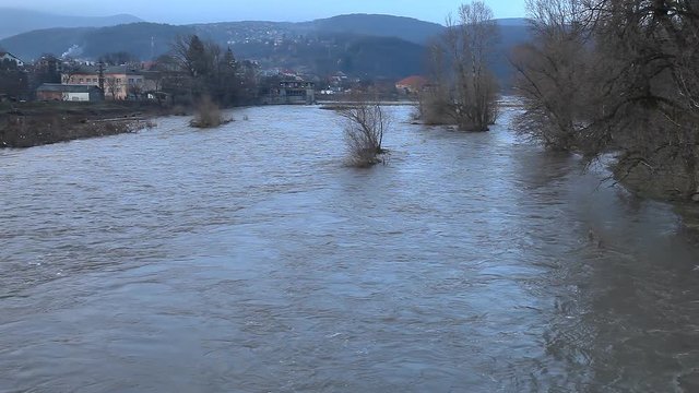 River burst its banks / River burst its banks after heavy rains