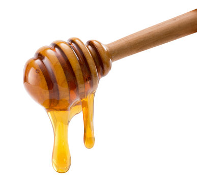 Naklejki honey dripping isolated on a white background