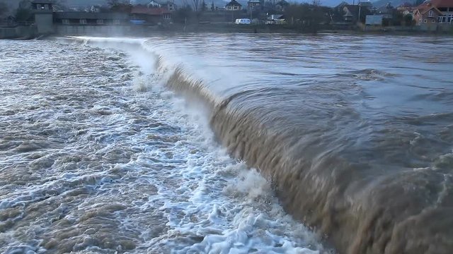 River burst its banks / River burst its banks after heavy rains