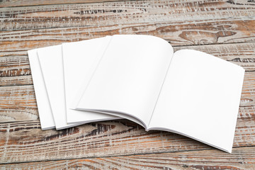Blank catalog, magazines,book mock up on wood background .