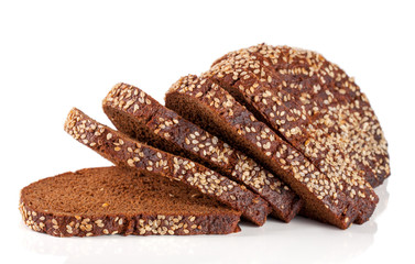 slices of black bread with sesame seeds isolated on white background