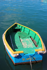 Fototapeta na wymiar colorful little boat in a harbor