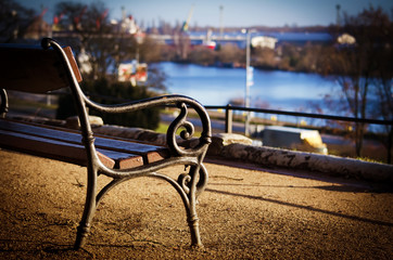 The old bench stands over the Oder River.