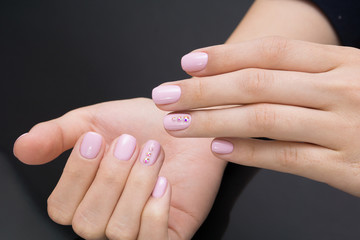 Fototapeta premium Natural nails and amazing clean manicure. Gel polish applied.