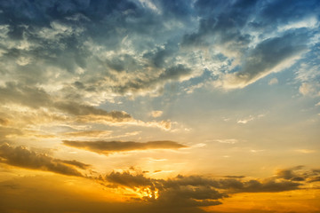 Fototapeta premium Bright sun with beams and the dark clouds