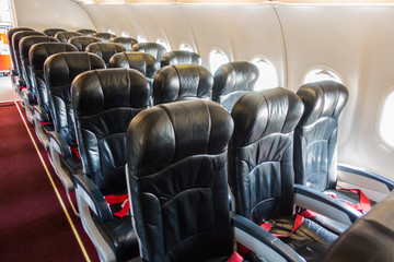 Airplane seats in the cabin .