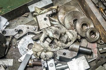 the gears and metal parts on the table