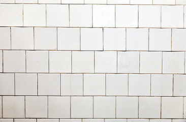 A bright wall of white tile.