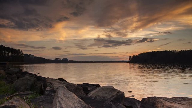 Lake Crabtree in Raleigh NC Timelapse at Dusk with Dramatic Clouds Moving Through the Sky on a Calm Evening in the Capitol of North Carolina