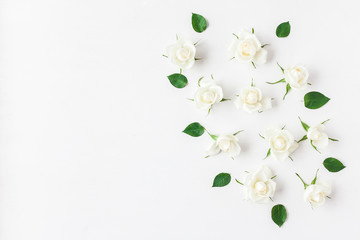 Flowers composition. Frame made of white rose flowers. Flat lay, top view
