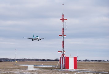 Landing of the passenger jet airplane at Vaclav havel airport in Prague, capitol of Czech Republic...