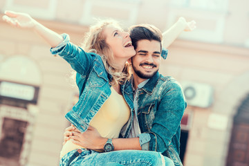 Happy young couple in the city